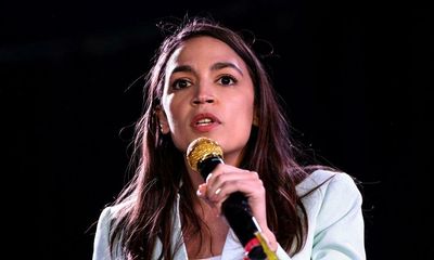 AOC calls Tucker Carlson ‘trash’ for saying she is not a woman of colour