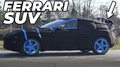 Ferrari Purosangue SUV Spied Covered In Blue Tape and Camo