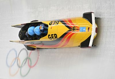 Germany's Friedrich writes history with Olympic bobsleigh double