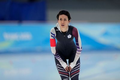 Taiwan premier wants athlete punished for wearing China suit