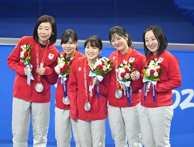 Japan settles for curling silver after crushing defeat