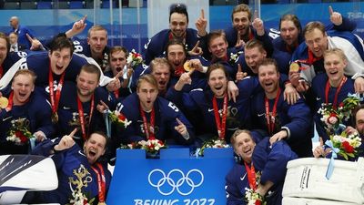 Finland wins historic Winter Olympics ice hockey gold medal after beating ROC team 2-1 in Beijing final