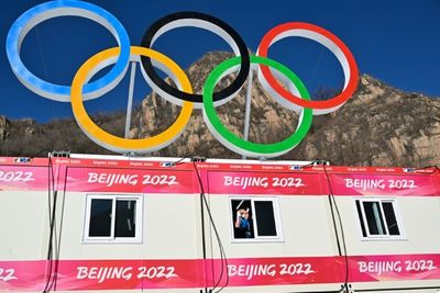 China celebrates record Winter Olympics haul -- and beating US