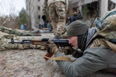 Explosions in eastern Ukraine as UK says Russian invasion “imminent”