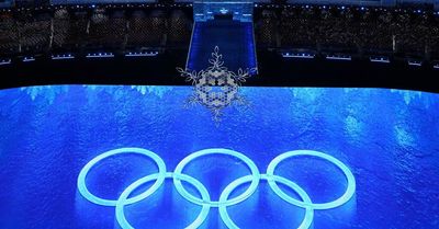 Beijing’s Winter Olympics close, ending safe but odd global moment