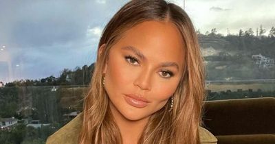 Chrissy Teigen says she's 'balls deep' in IVF and begs fans not to ask if she's pregnant