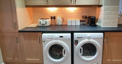Couple saves thousands creating stunning black kitchen for under £850 themselves