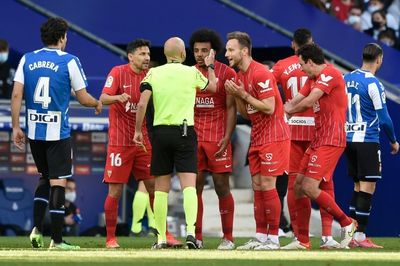 Sevilla lose ground to Madrid after draw at Espanyol