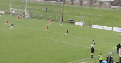 Meath player's free kick nearly comes back to his feet in wild weather