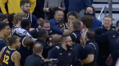 Michigan Coach Juwan Howard Swings at Wisconsin Assistant, Sparking Postgame Scuffle