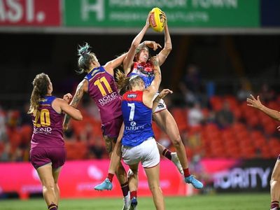 Harris lifts Demons to AFLW win over Lions
