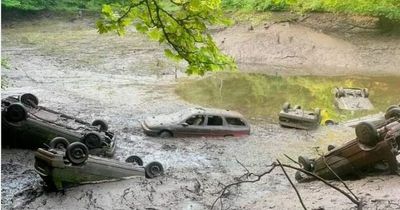 Work begins to remove rusty and abandoned cars from water at Paisley beauty spot