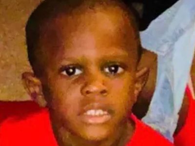 Six-year-old boy killed and brother among four injured in drive-by shooting at Mississippi basketball court