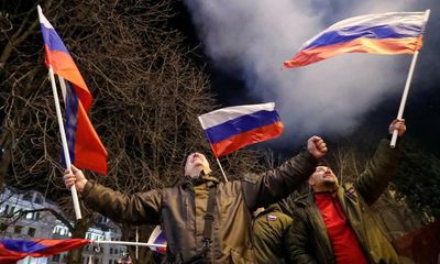 Dismay and condemnation as west begins to impose sanctions on Russia