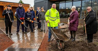 Housing developers donate top soil to help Lanarkshire village's community garden improvement project