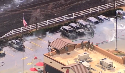 Grass fire engulfs multiple cars at Oklahoma City Chick-Fil-A