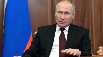 Russian President Vladimir Putin orders Russian forces to 'maintain peace' in eastern Ukraine's two breakaway regions