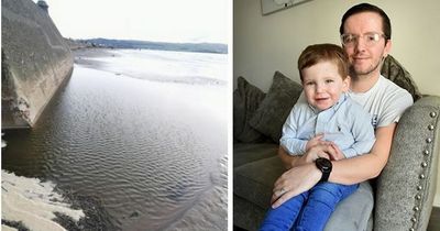 Terror on beach as dad rescues drowning son, two, from dangerous sand sinkhole