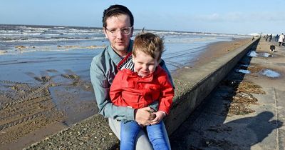 Hero dad rescues drowning son, 2, at beach before getting trapped in ‘sinking sand’