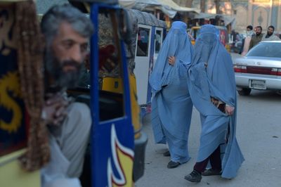 Women workers must cover up 'even with a blanket', say Afghan Taliban