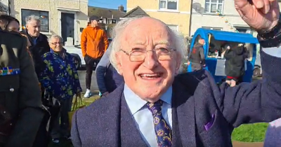 President Michael D Higgins battles horrendous weather to honour actor Johnny Murphy and the people of Drimnagh