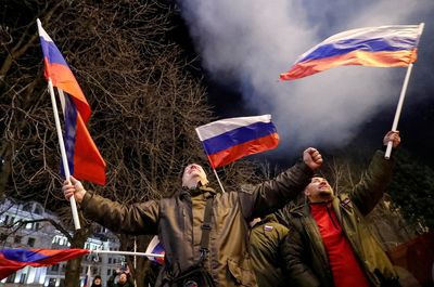 Hope, fear and uncertainty on Donetsk streets after Putin move