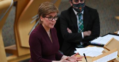 Scotland vows to keep free tests in furious split with Boris Johnson