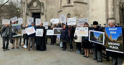 Protestors against national Holocaust memorial gather outside Royal Courts of Justice