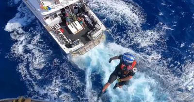 'Truly terrifying' moment man bitten by shark while fishing rescued by coastguard