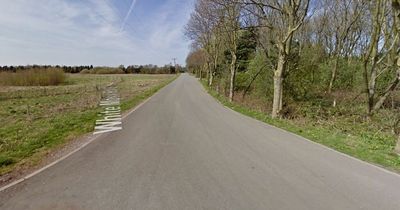 Road and bridge sealed off after body found