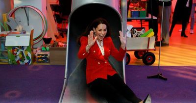 Giggling Kate Middleton zooms down a slide during whirlwind solo visit to Denmark