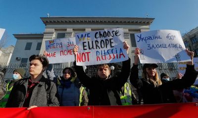 ‘We’re not afraid of Putin’: defiance on the streets of Kyiv