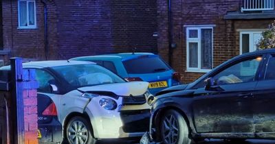 Moment driver ploughs into oncoming car during police chase through quiet Dukinfield estate