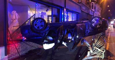 Four taken to hospital after car smashes through front window of bridal shop