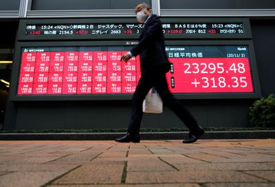 Asian markets regain ground as investors hold breath on Ukraine
