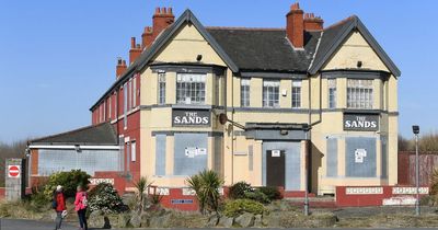 Boarded up pub next to tourist hotspot goes up for sale
