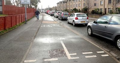 Safety concerns raised over backed-up traffic stopping at busy level crossing