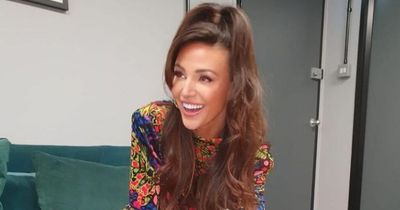 Michelle Keegan told to 'stop it' as she dons psychedelic mini dress for Drag Race debut