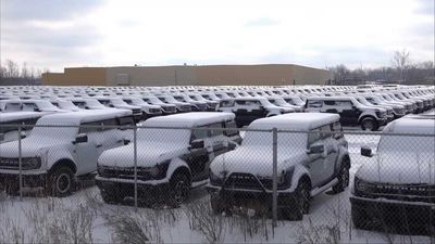 Unfinished Ford Bronco SUVs Sit And Wait For Chips In Open Lot