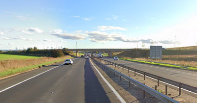 M8 traffic chaos as 'van blown onto side' on busy motorway