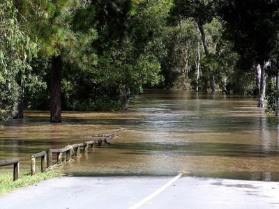 Body of motorcyclist found in Qld floods