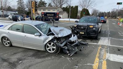 VIDEO: Alleged Drunken Driver Crashes Head-On Into Police Car And Injures 2 Officers