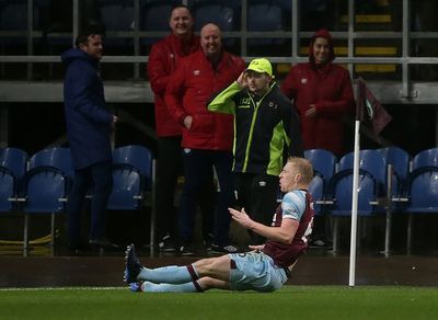 Ben Mee heads winner as Burnley stun Tottenham to boost survival hopes