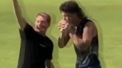 Two-week ban for on-field sip of beer, but footy player says punishment does not fit crime