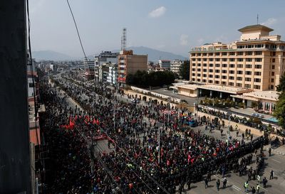 Nepali police clash with protesters opposed to U.S. aid grant