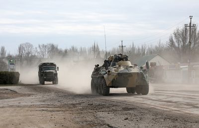 Russian military convoy in annexed Crimea seen moving north