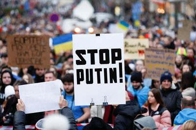 'I don't know what to do': fleeing Ukrainians start arriving in central Europe