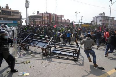 Protesters against US aid grant clash with police in Nepal