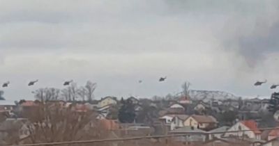 Terrifying footage shows Russian gunships blitz airport as they swarm Ukrainian capital