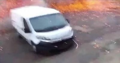 Cyclist seen being hit by explosive missile in city after Russia invades Ukraine